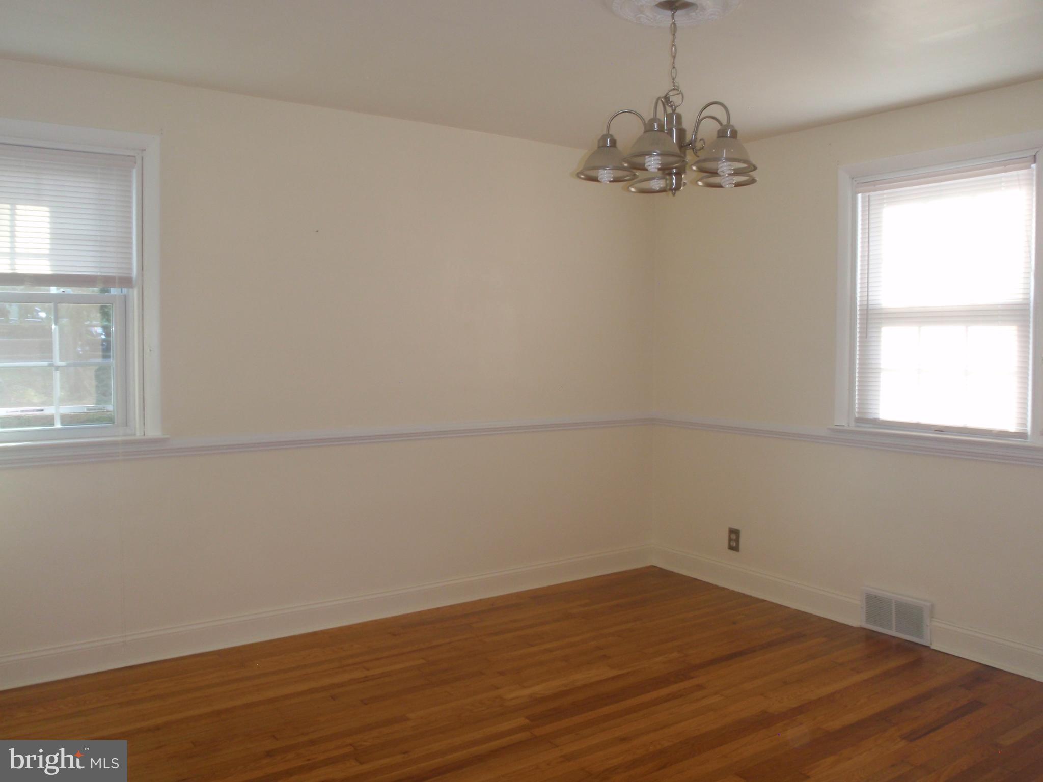 100 Moore Road Wallingford, PA 19086 - Photo 6 of 14 Formal dining room w/chandelier