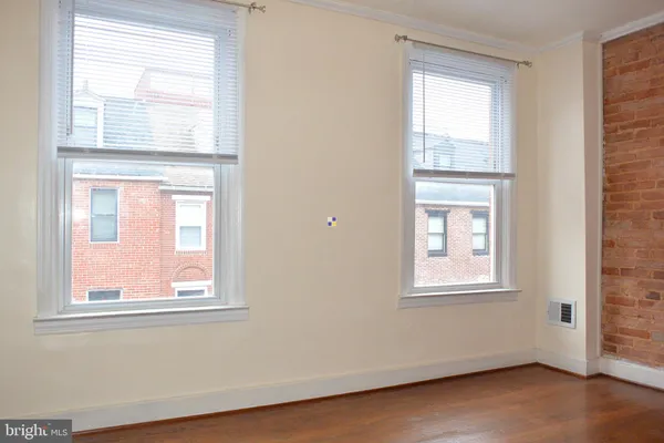 an empty room with windows