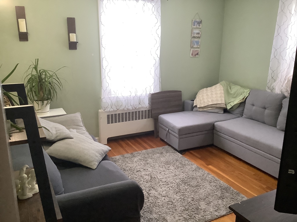 2 Chapel Road Danvers, MA 01923 - Photo 6 of 15 a living room with furniture and a rug
