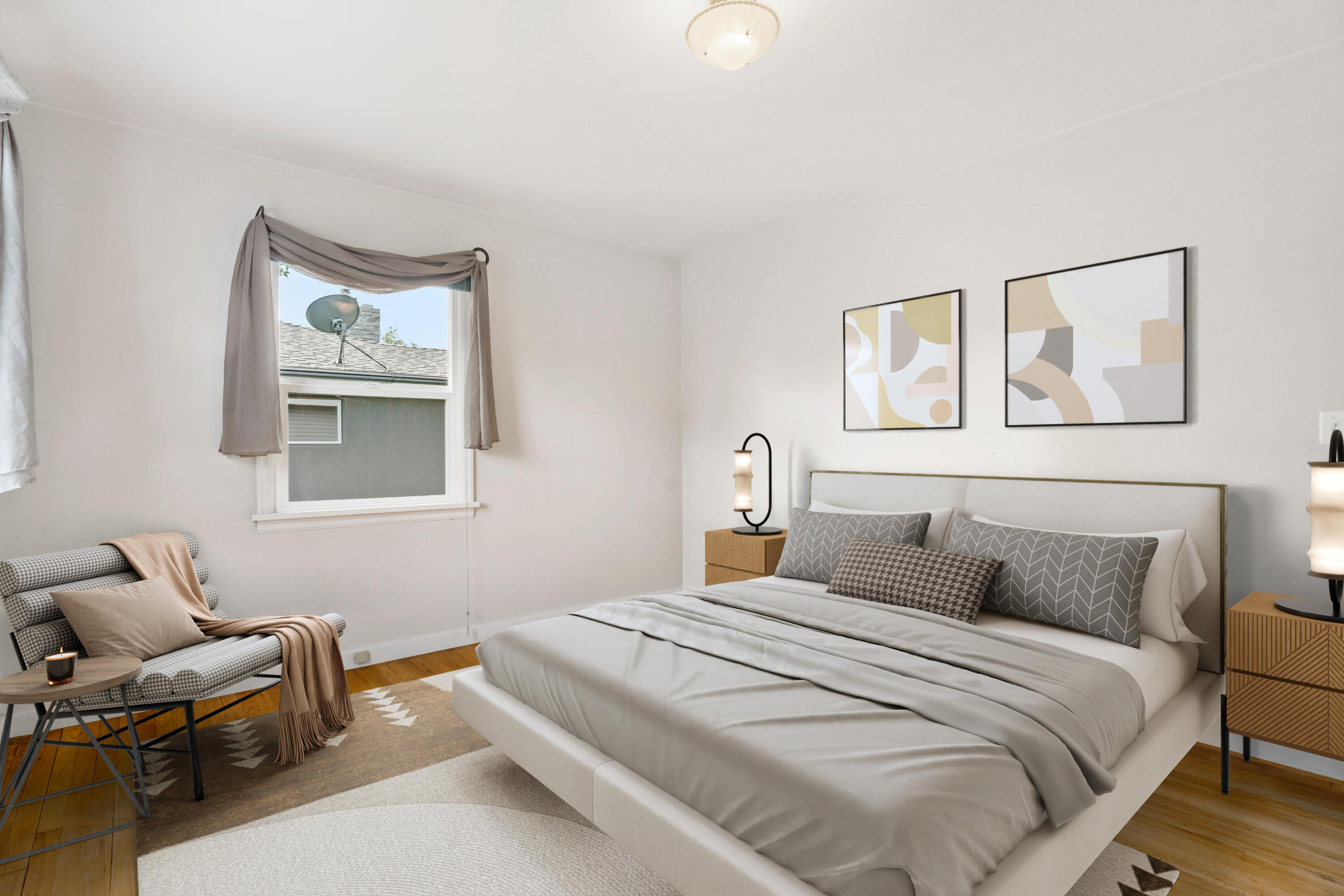 946 Southwest 13th Street Redmond, OR 97756 - Photo 26 of 49 a bedroom with a bed and wooden floor