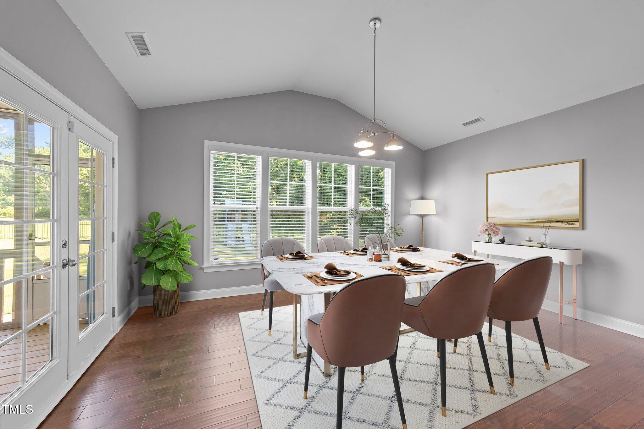 4125 Olde Judd Drive Willow Spring, NC 27592 - Photo 15 of 48 a view of a dining room with furniture window and outside view