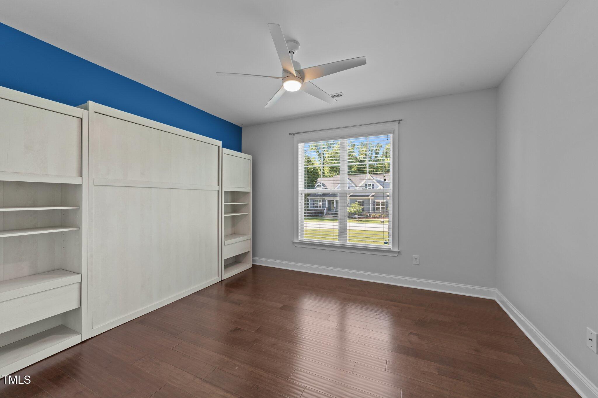 4125 Olde Judd Drive Willow Spring, NC 27592 - Photo 29 of 48 wooden floor in an empty room with a window