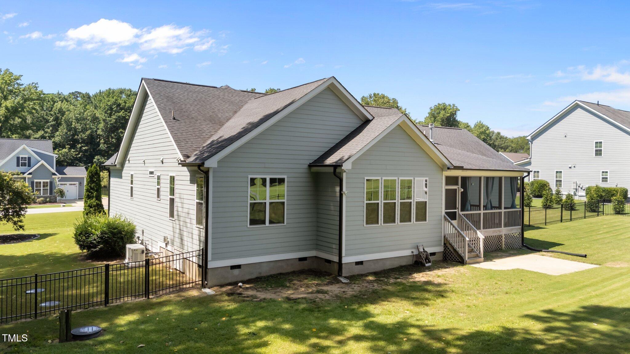 4125 Olde Judd Drive Willow Spring, NC 27592 - Photo 40 of 48 a view of a house with backyard and sitting area