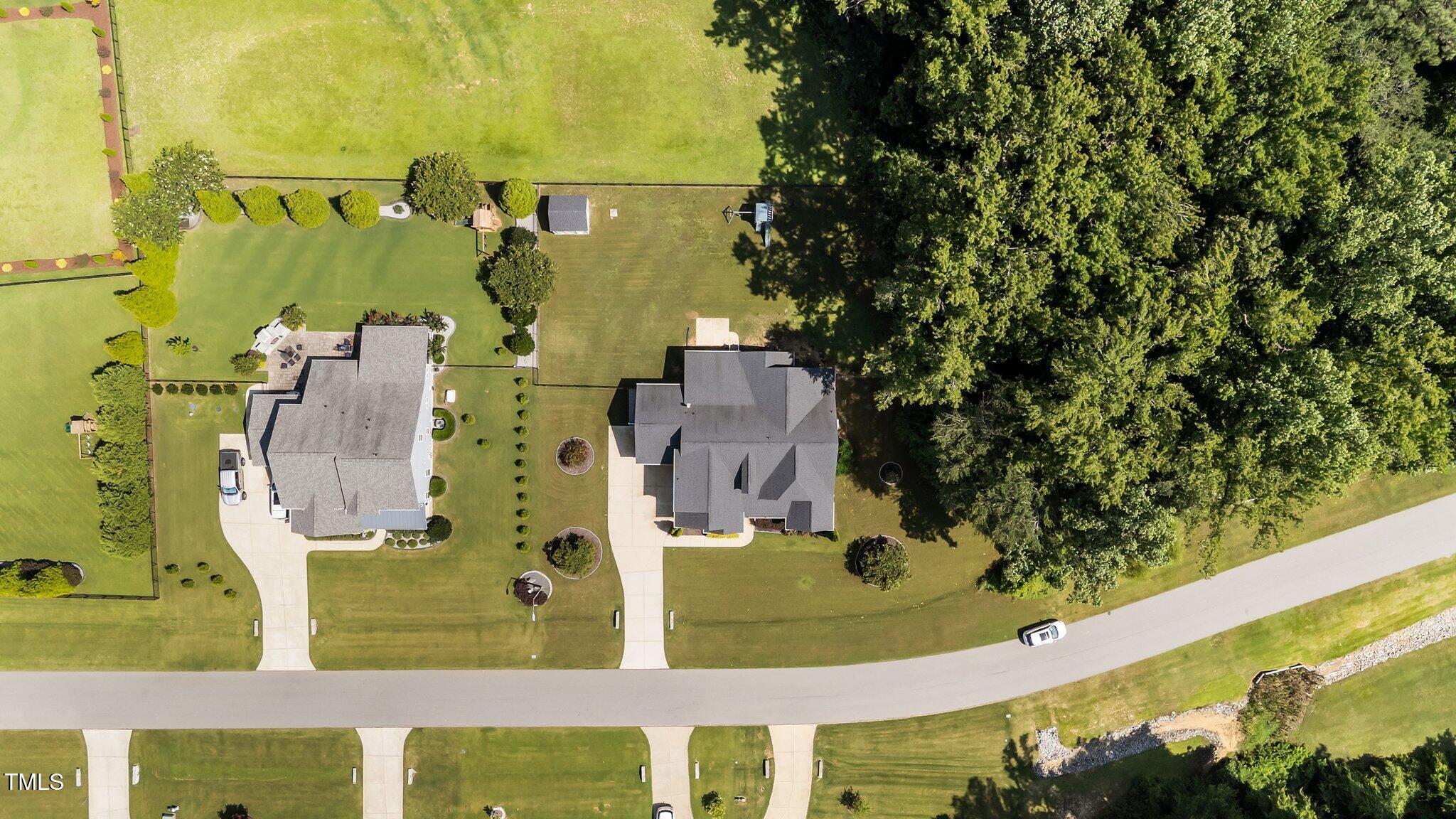 4125 Olde Judd Drive Willow Spring, NC 27592 - Photo 44 of 48 an aerial view of residential houses with outdoor space