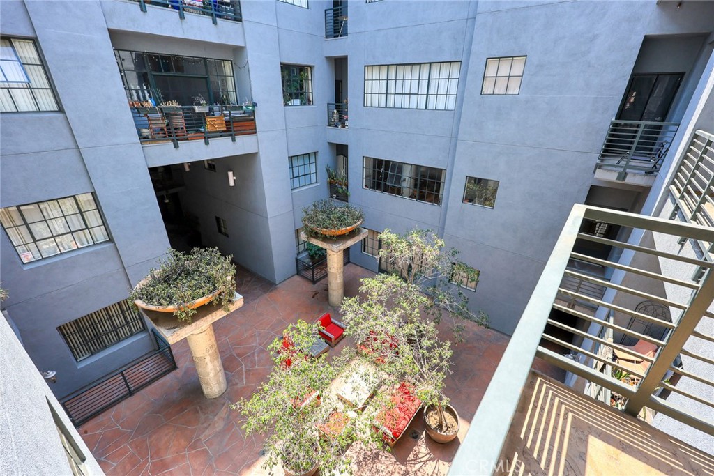 420 San Pedro Street, Unit 427 Los Angeles, CA 90013 - Photo 26 of 42 a front view of a house with outdoor seating