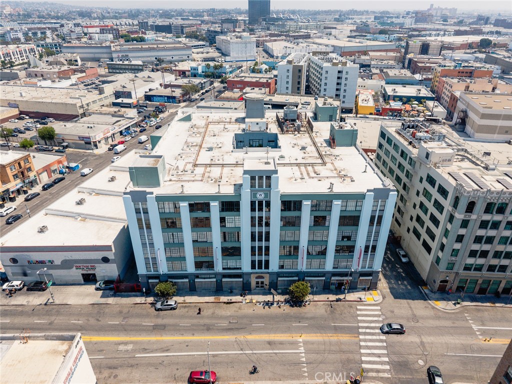 420 San Pedro Street, Unit 427 Los Angeles, CA 90013 - Photo 40 of 42 an aerial view of multi story residential apartment building