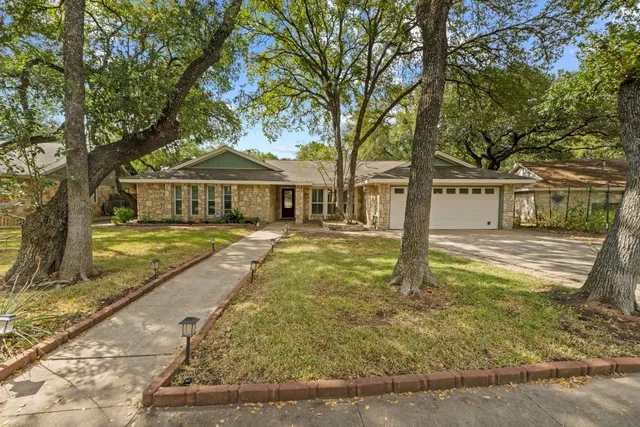 a view of a house with swimming pool