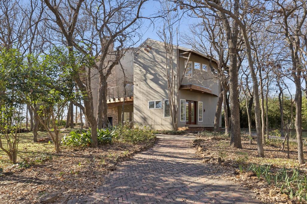 540 Diamond Point Drive Oak Point, TX 75068 - Photo 5 of 27 View of front facade featuring a balcony