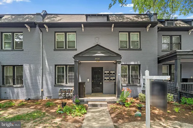 a car parked in front of a house