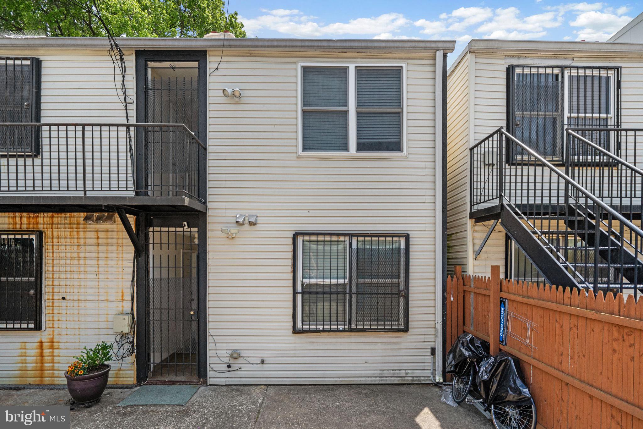 1658 West Virginia Avenue Northeast, Unit 101 Washington, DC 20002 - Photo 28 of 29 a view of a house with a door and a window