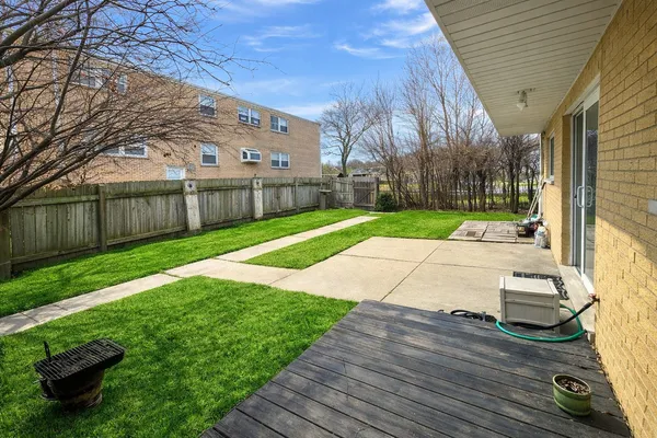 a view of a backyard with a garden