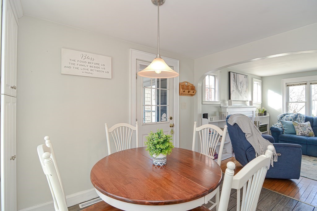 35 Colasanti Road Weymouth, MA 02191 - Photo 13 of 39 a view of a dining room with furniture window and wooden floor