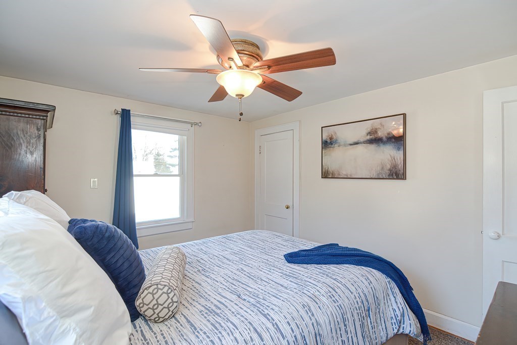 35 Colasanti Road Weymouth, MA 02191 - Photo 15 of 39 a bedroom with a bed and a window
