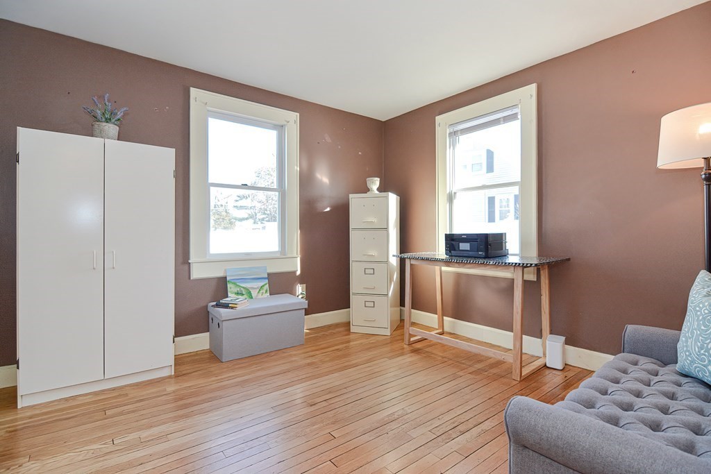 35 Colasanti Road Weymouth, MA 02191 - Photo 17 of 39 a living room with furniture and a window