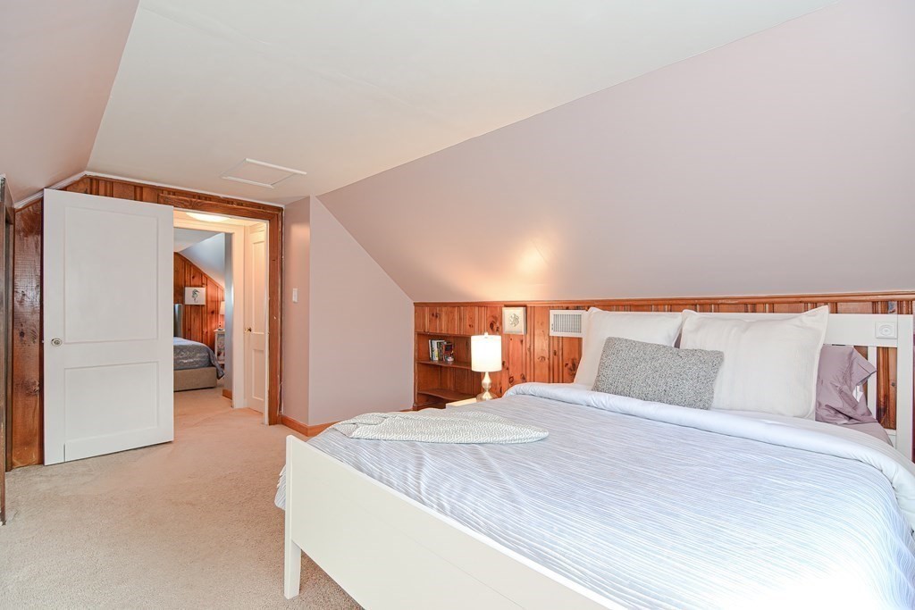 35 Colasanti Road Weymouth, MA 02191 - Photo 22 of 39 a bedroom with a large bed and a large window