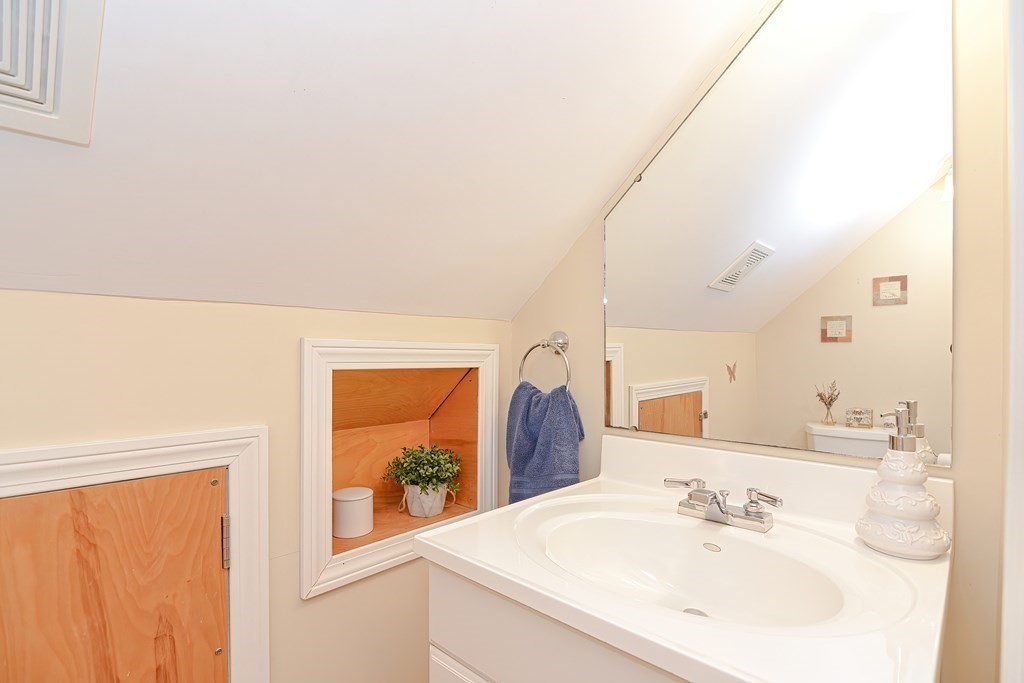 35 Colasanti Road Weymouth, MA 02191 - Photo 24 of 39 a bathroom with a sink and a mirror