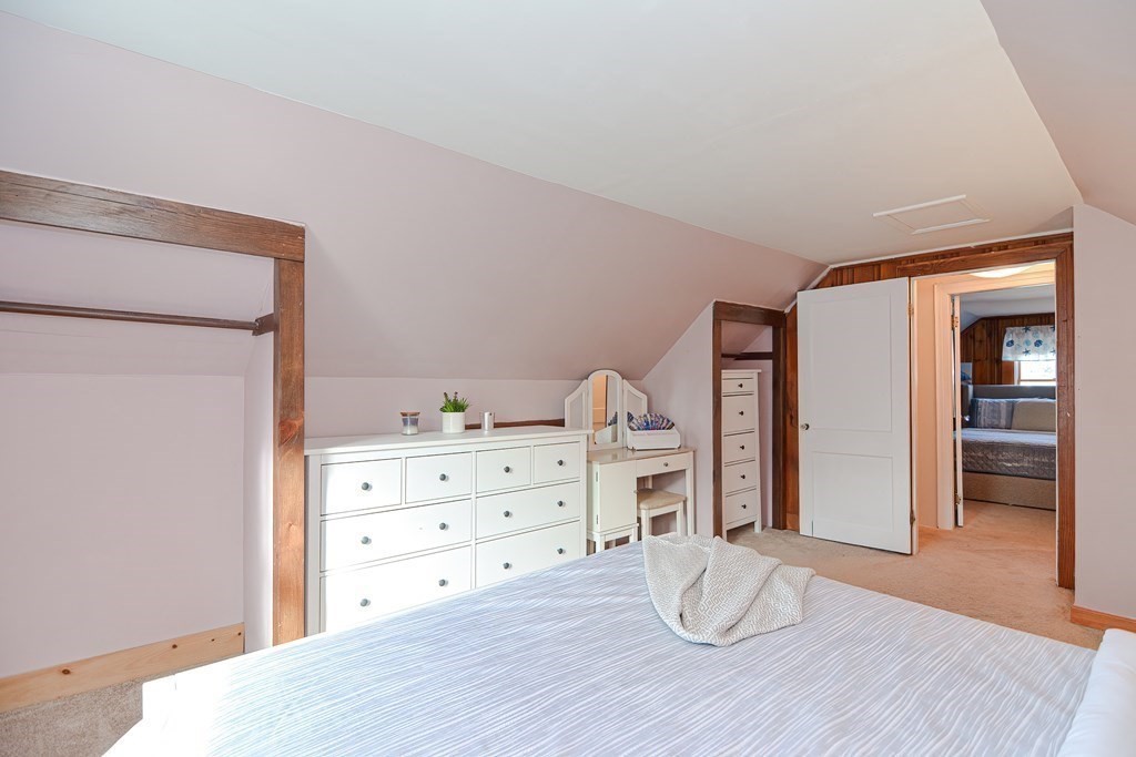 35 Colasanti Road Weymouth, MA 02191 - Photo 25 of 39 a room with wooden floors and dresser