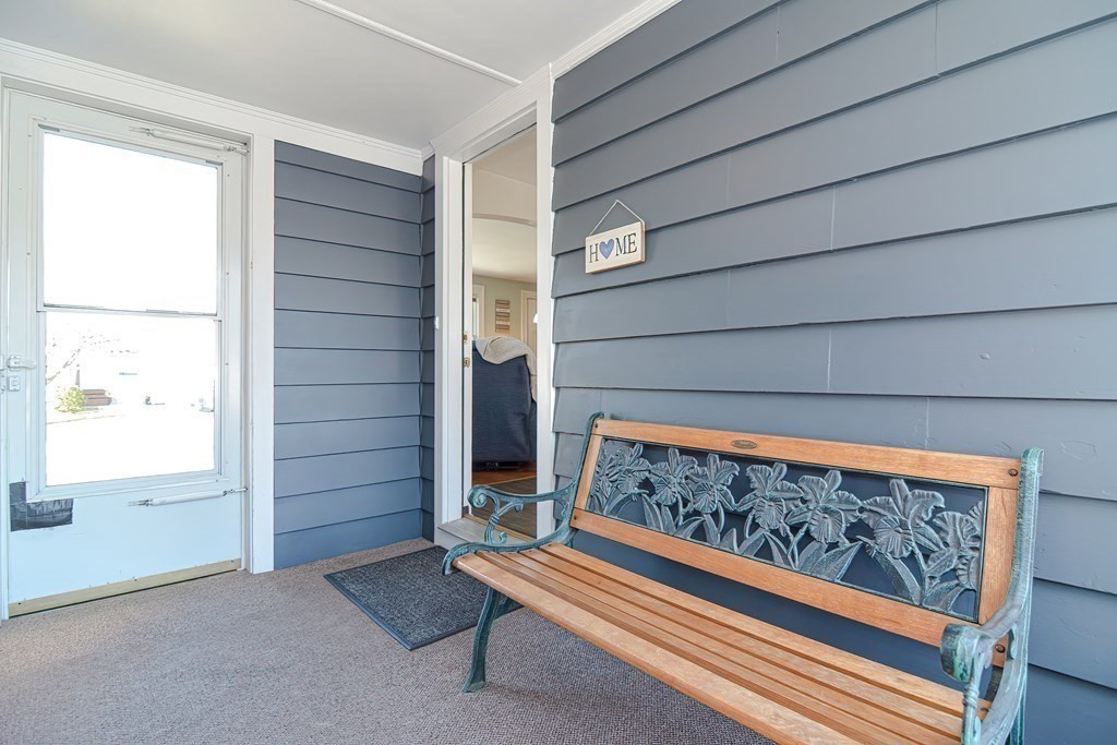 35 Colasanti Road Weymouth, MA 02191 - Photo 29 of 39 a wooden bench sitting in front of a window