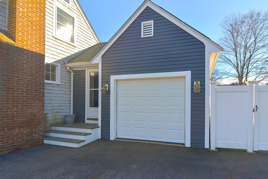 35 Colasanti Road Weymouth, MA 02191 - Photo 38 of 39 a front view of a house with a garage