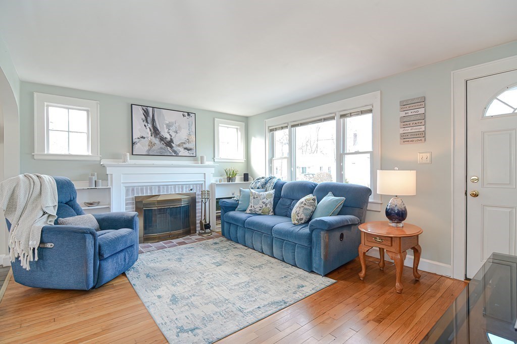 35 Colasanti Road Weymouth, MA 02191 - Photo 4 of 39 a living room with furniture and a fireplace
