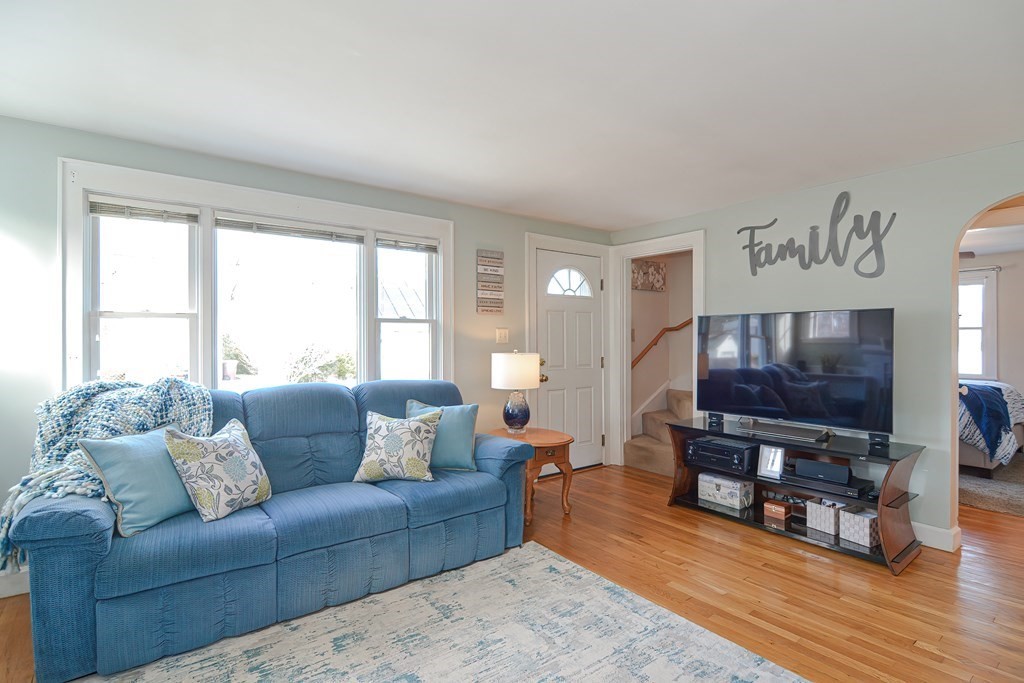 35 Colasanti Road Weymouth, MA 02191 - Photo 5 of 39 a living room with furniture and a flat screen tv