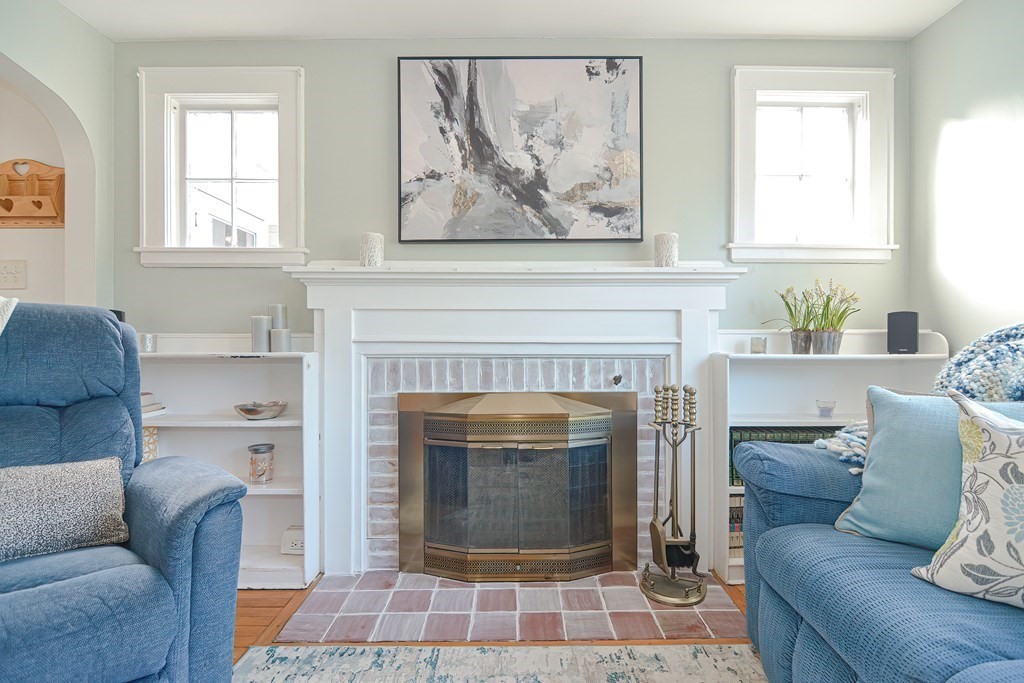 35 Colasanti Road Weymouth, MA 02191 - Photo 6 of 39 a living room with furniture and a fireplace