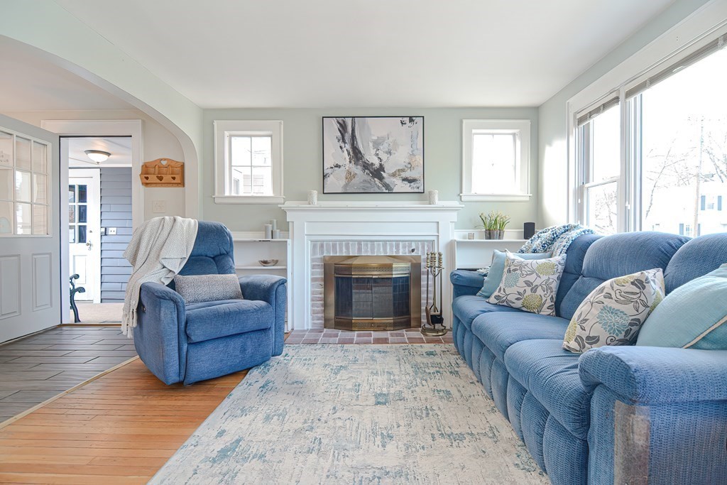 35 Colasanti Road Weymouth, MA 02191 - Photo 8 of 39 a living room with furniture and a fireplace