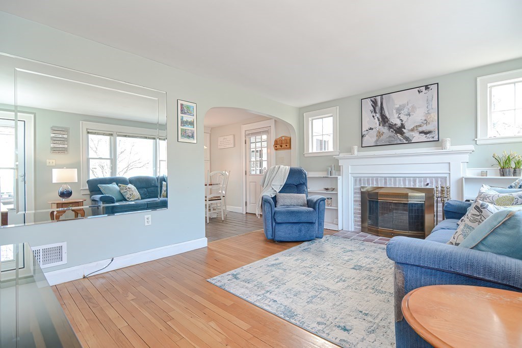 35 Colasanti Road Weymouth, MA 02191 - Photo 9 of 39 a living room with furniture and a fireplace
