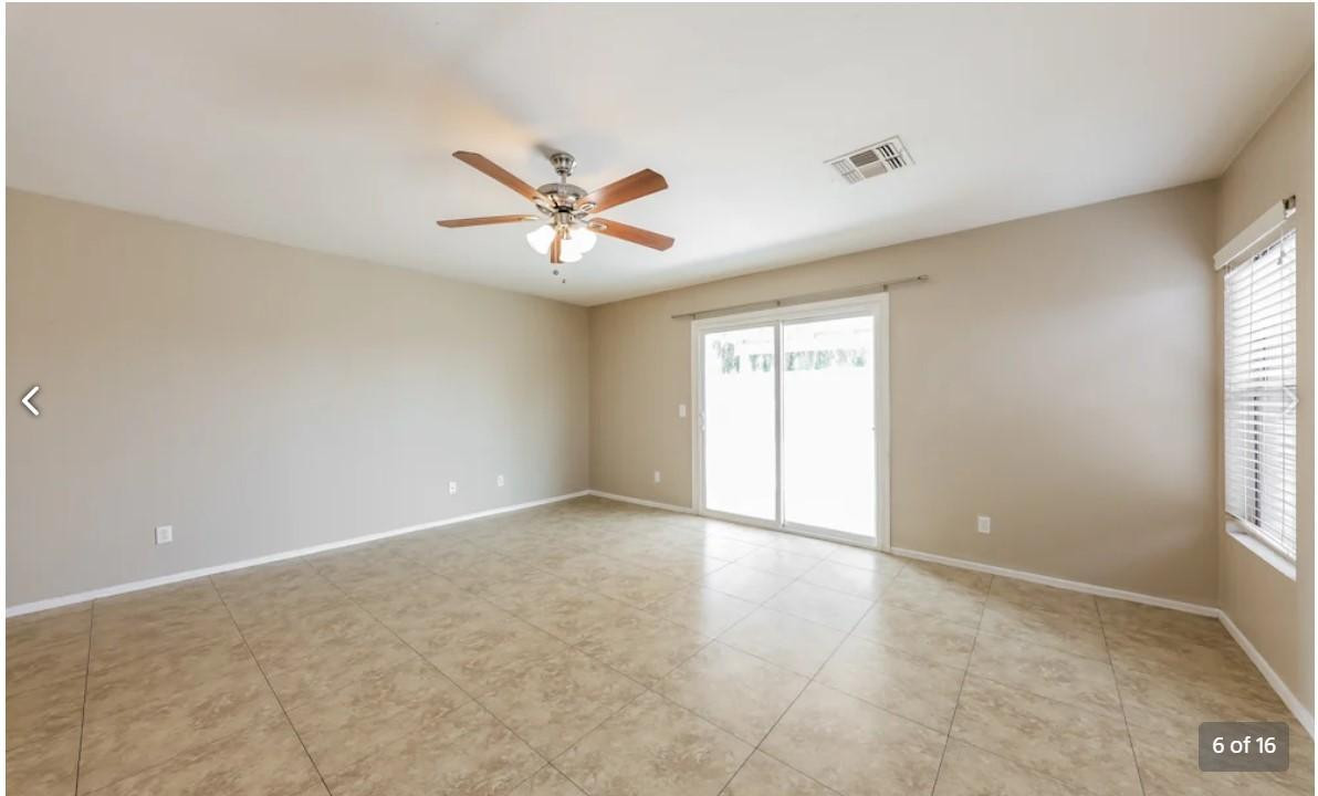 12563 West Charter Oak Road El Mirage, AZ 85335 - Photo 6 of 16 a view of an empty room with a window