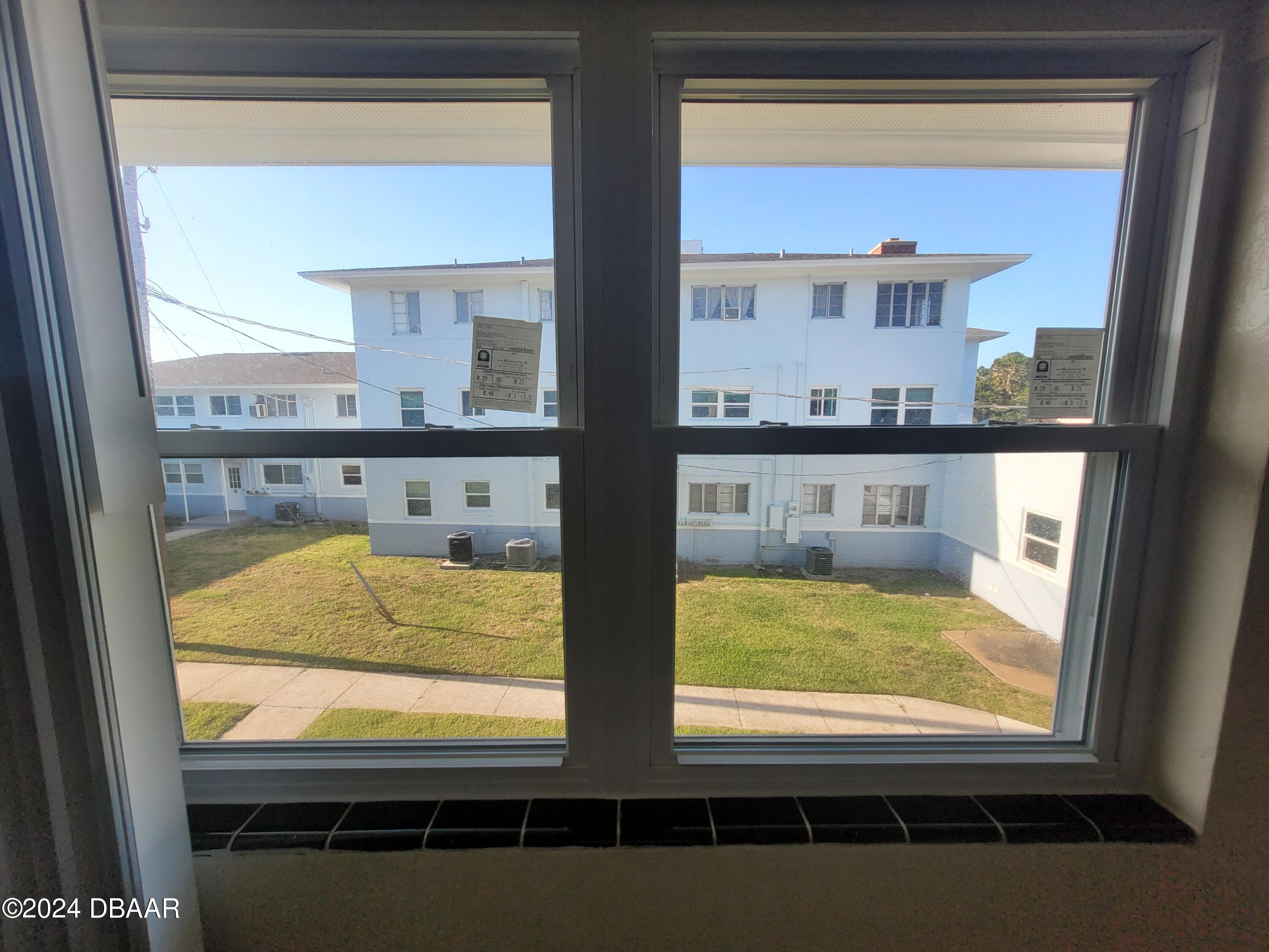 500 South Beach Street, Unit J4 Daytona Beach, FL 32114 - Photo 19 of 36 a view of kitchen from window