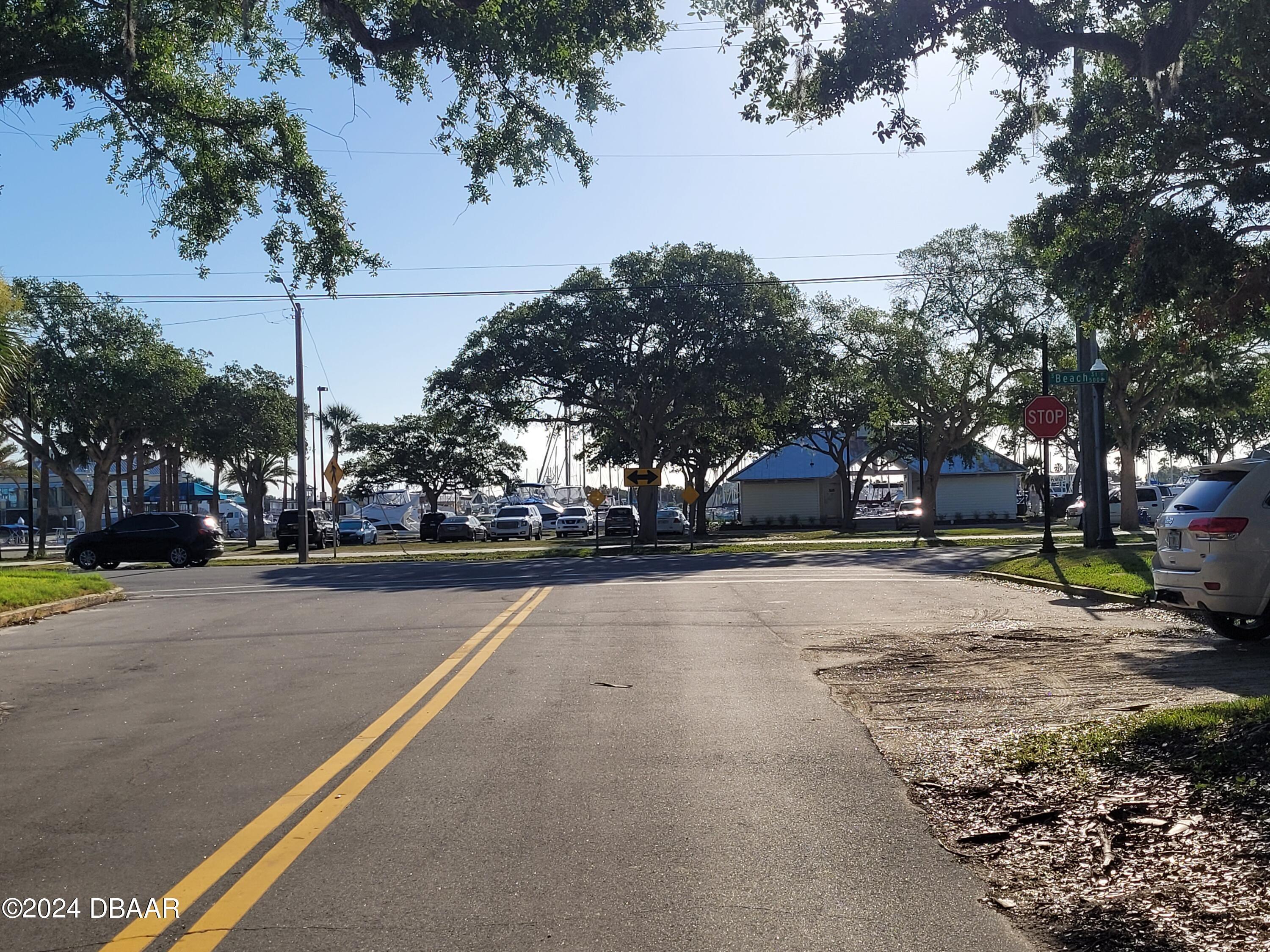 500 South Beach Street, Unit J4 Daytona Beach, FL 32114 - Photo 31 of 36 a view of a street with houses