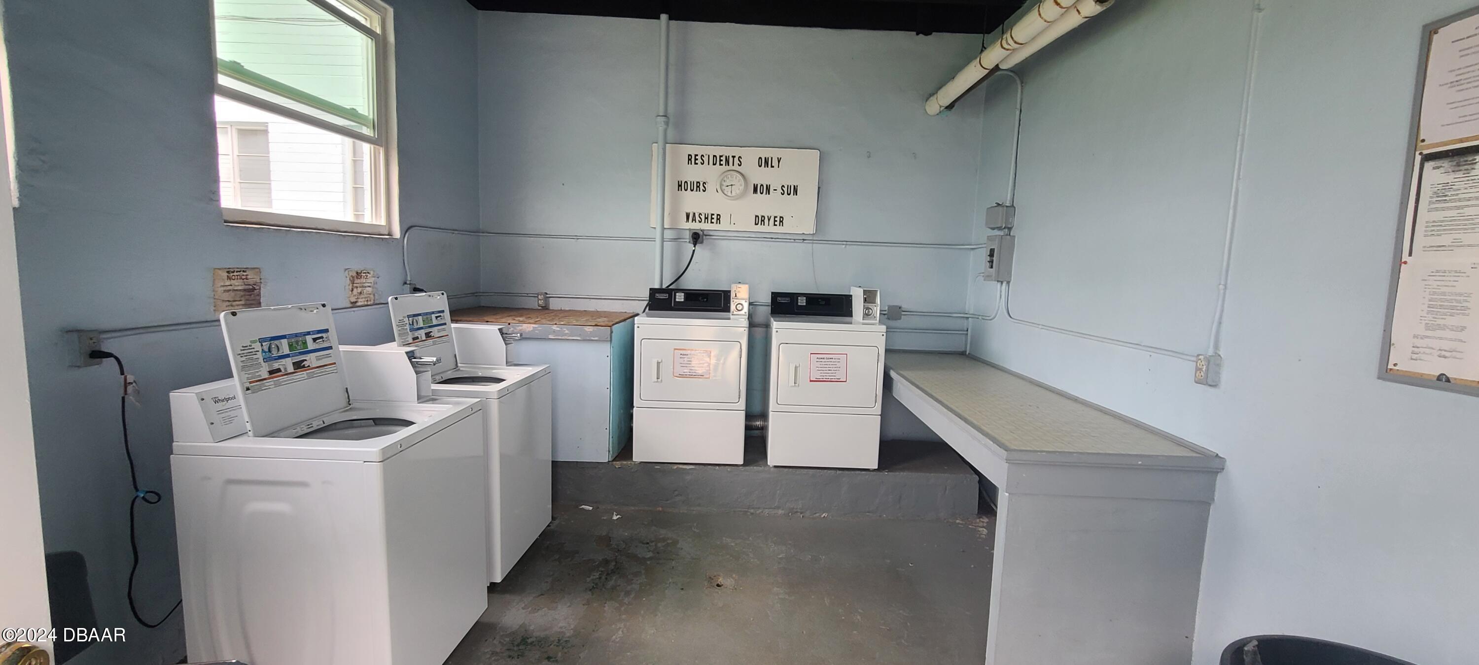 500 South Beach Street, Unit J4 Daytona Beach, FL 32114 - Photo 34 of 36 a utility room with dryer and washer
