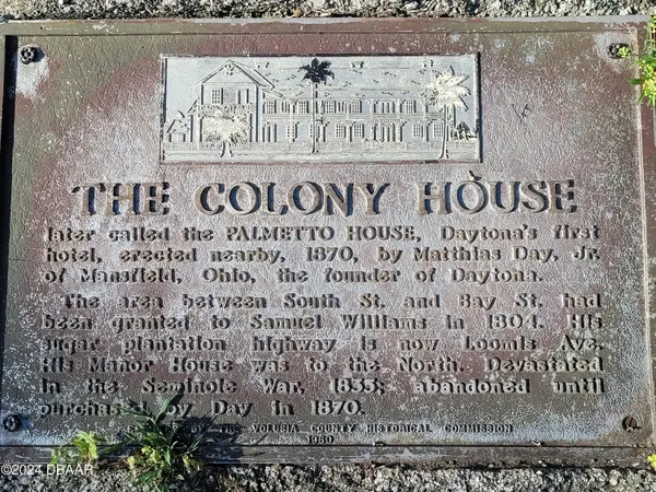 a sign on the side of building