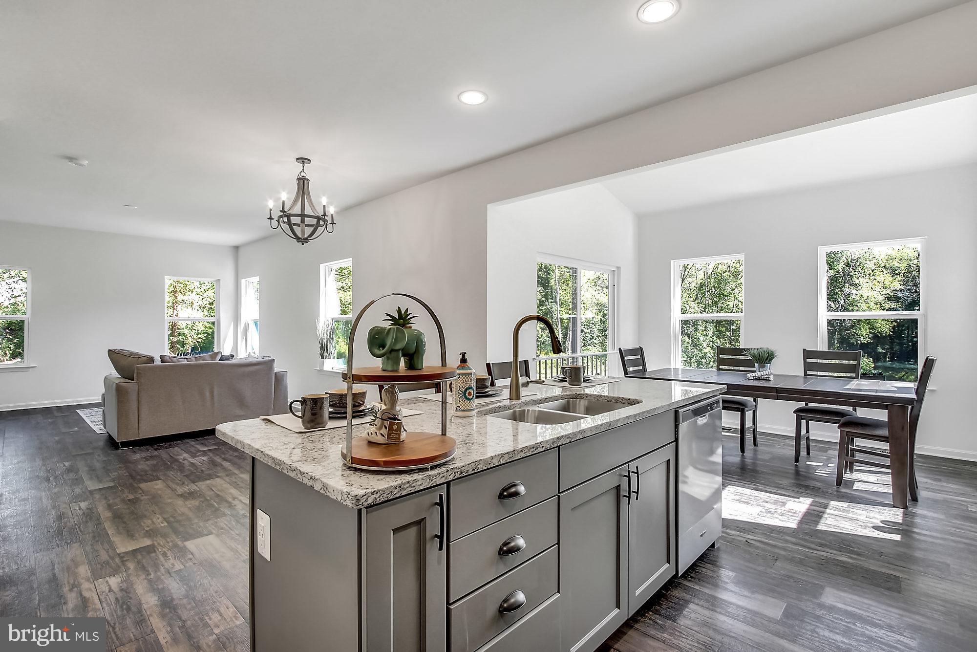 513 Dembytown Road Joppa, MD 21085 - Photo 5 of 25 Upgraded crisp grey cabinetry and granite counters