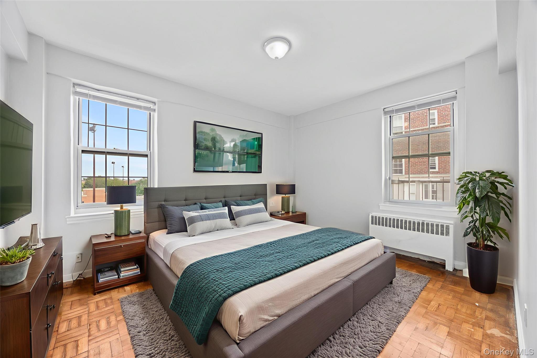 a bedroom with a balcony a bed and a couch