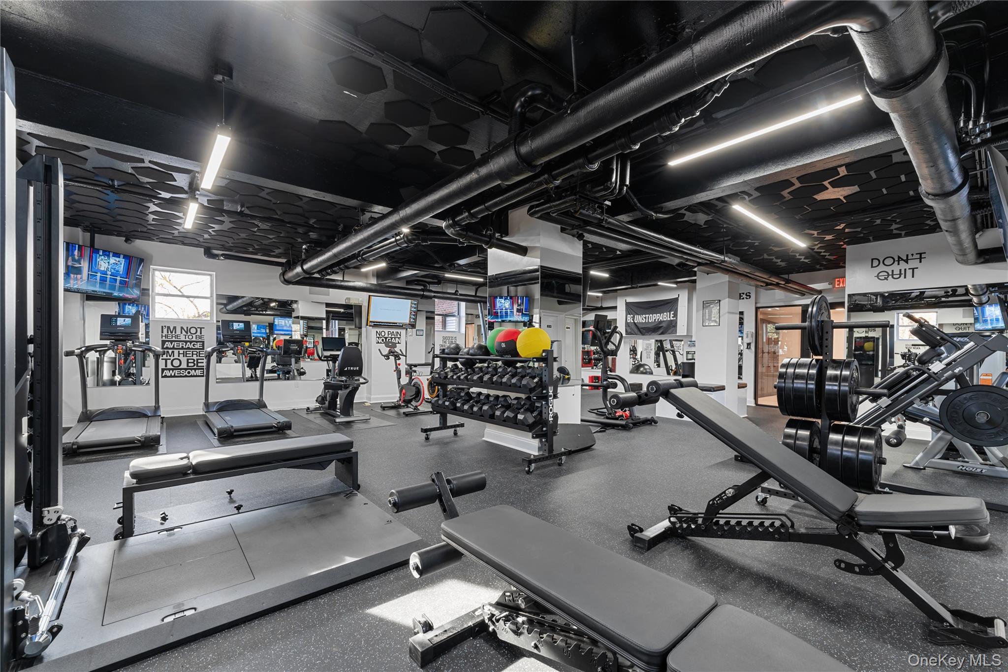 210 Pelham Road, Unit 5M New Rochelle, NY 10805 - Photo 11 of 26 a view of a room with gym equipment