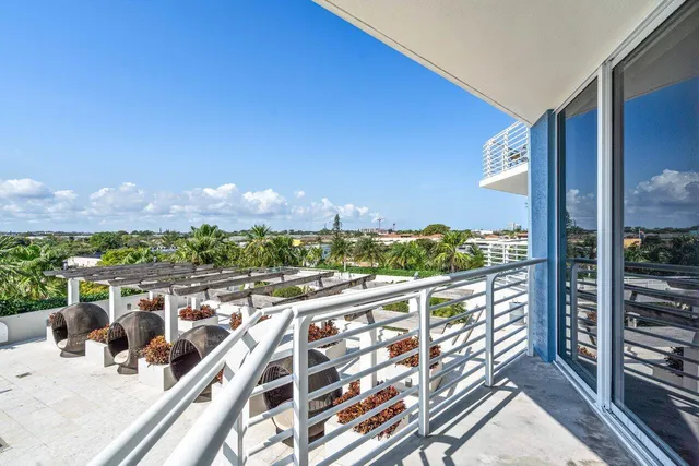 a view of balcony with furniture