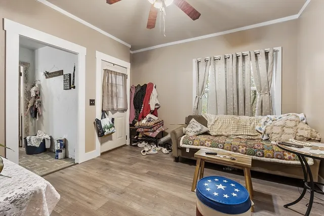 a room with furniture and a wooden floor