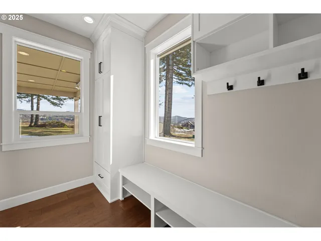 a room with window and wall painting