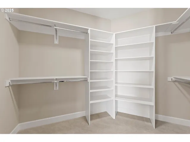 a view of an empty walk in closet