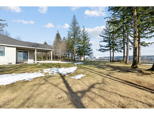 a view of a house with basketball court