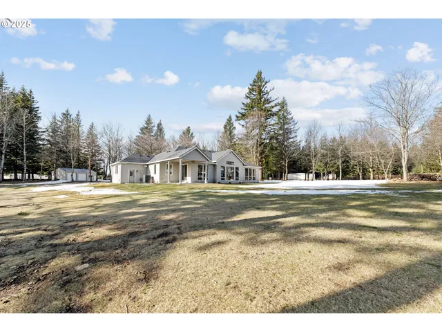 a view of houses with yard