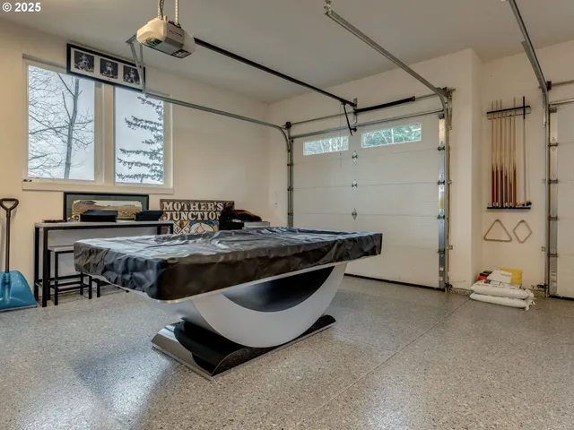 a kitchen with a sink and a refrigerator