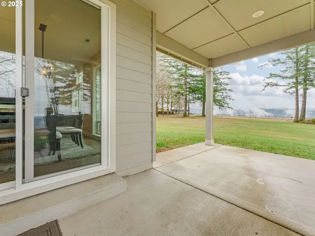a view of a room with a large window