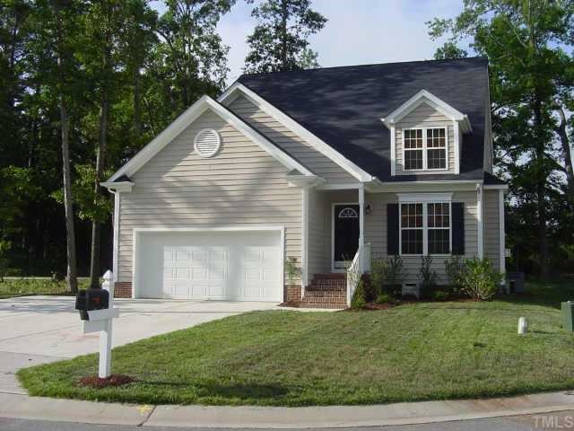 5205 Groveside Court Raleigh, NC 27613 - Photo 1 of 1 a front view of a house with garden