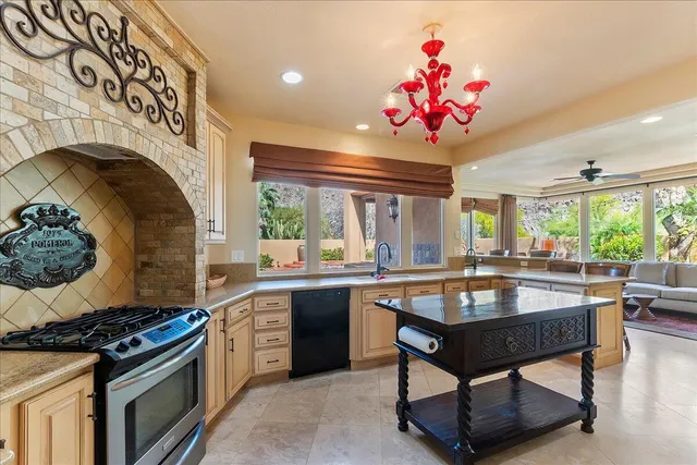 a bathroom with a sink a mirror a toilet and shower