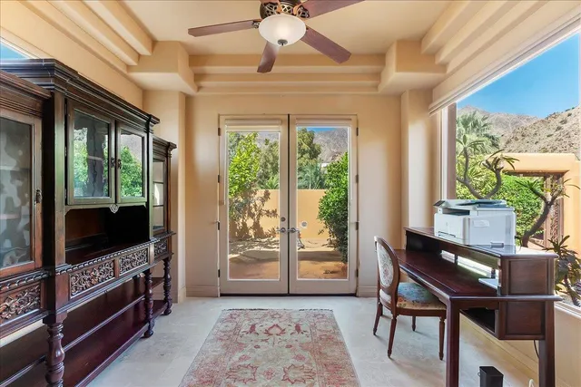 a large bathroom with double vanity and a bathtub