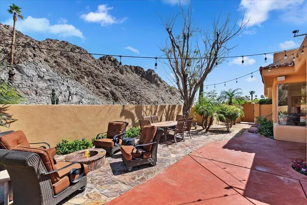 a view of yard with patio