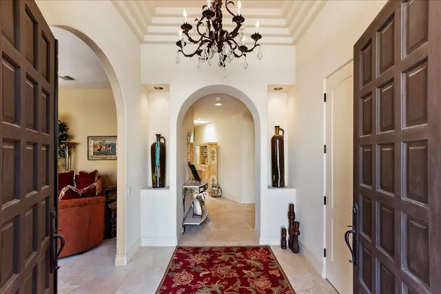 a view of a livingroom with furniture and a tub