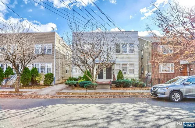 a view of a building with a street